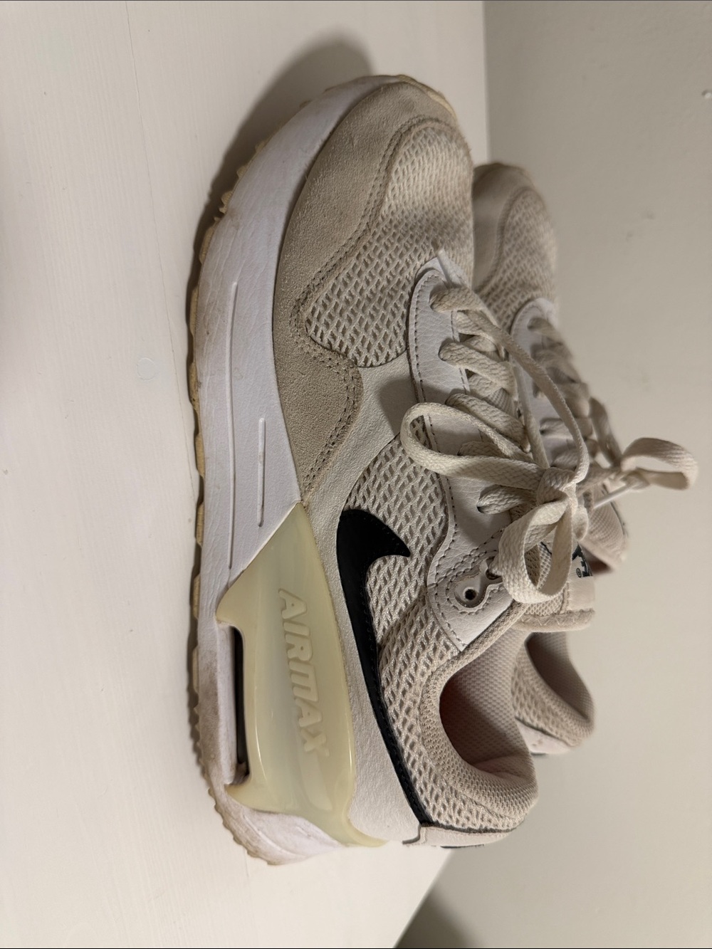 Nike Women's Athletic Sneakers in Beige with Black Swoosh